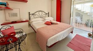 Ponza Le Forna tesisinde bir odada yatak veya yataklar