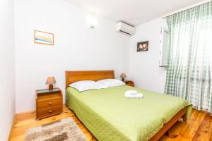 Posteľ alebo postele v izbe v ubytovaní Apartment Leo