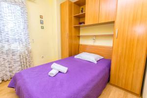 Posteľ alebo postele v izbe v ubytovaní Apartment Leo