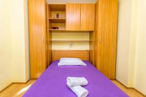 Posteľ alebo postele v izbe v ubytovaní Apartment Leo