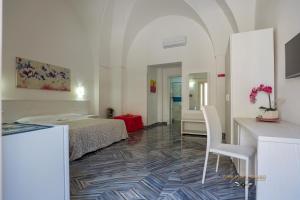 A television and/or entertainment centre at Casa Alfieri"rooms and Apartments"