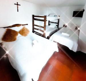 Postel nebo postele na pokoji v ubytování Balcones de San Sebastian