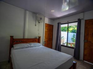 Postel nebo postele na pokoji v ubytování Playa Negra Home's CR