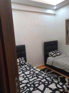 Photo de la galerie de l'établissement Superbe Appartement Vue sur Piscine à Bouznika, à Bouznika