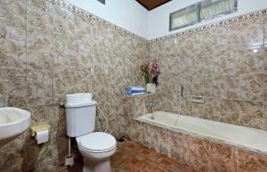 Ein Badezimmer in der Unterkunft Rumah Akira Seminyak