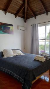 Ένα ή περισσότερα κρεβάτια σε δωμάτιο στο CasaCinema