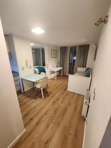 Ein Bett oder Betten in einem Zimmer der Unterkunft Apart Lyon Suite