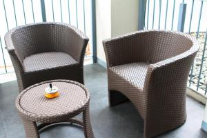 Predel za sedenje v nastanitvi Z Pad Residences