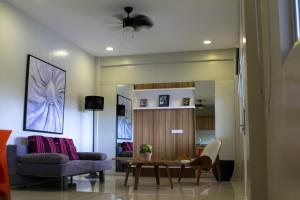 Predel za sedenje v nastanitvi Z Pad Residences