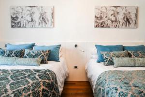 Ένα ή περισσότερα κρεβάτια σε δωμάτιο στο Ámbar Suites