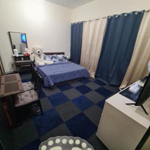 Postel nebo postele na pokoji v ubytování Ghurfati