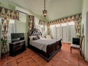 En eller flere senge i et værelse på La Rinconada Beachfront Retreat