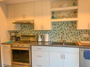 A kitchen or kitchenette at Windslow Guest Suite at Kye Bay