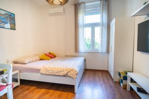 Postel nebo postele na pokoji v ubytování Goga Nova