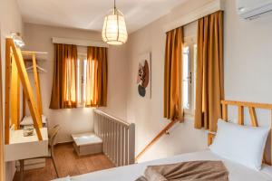 Giường trong phòng chung tại Sunrise Limnionas Apartments