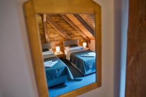 Postel nebo postele na pokoji v ubytování Hotel U Lípy