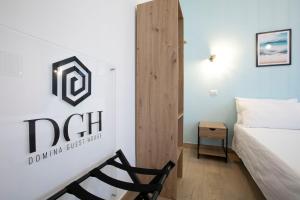 Postel nebo postele na pokoji v ubytování DOMINA Guest House