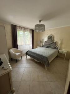 En eller flere senge i et værelse på 2 Apartment Verano Del Mar Sozopol