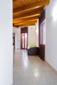 A bed or beds in a room at Villa La Vigna