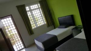 Μια τηλεόραση ή/και κέντρο ψυχαγωγίας στο PKA Homestay - Sewa Bilik