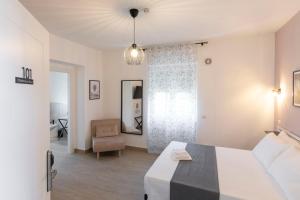 Postel nebo postele na pokoji v ubytování DOMINA Guest House