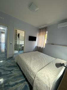 A bed or beds in a room at ''Dimora BellaVista'' - Marina di Camerota