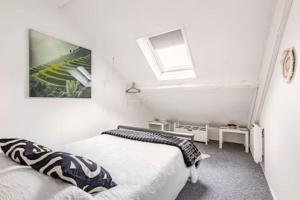 Postel nebo postele na pokoji v ubytování MAISON CENTRE VILLE + GARAGE