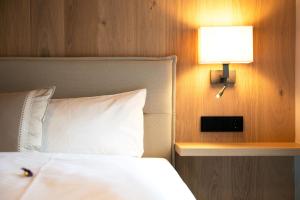 Posteľ alebo postele v izbe v ubytovaní Genuss- & Aktivhotel Sonnenburg