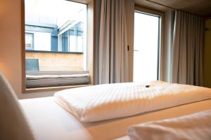 Posteľ alebo postele v izbe v ubytovaní Genuss- & Aktivhotel Sonnenburg