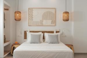 A bed or beds in a room at Agia Anna Living
