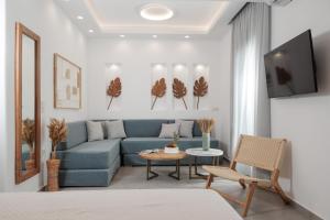 A seating area at Agia Anna Living