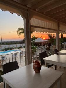 A balcony or terrace at Arbor Exclusive B&B
