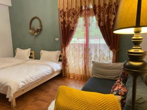 Postel nebo postele na pokoji v ubytování Sea Princess B&B
