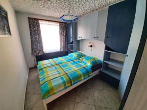 Postel nebo postele na pokoji v ubytování 4 féröhelyes apartman