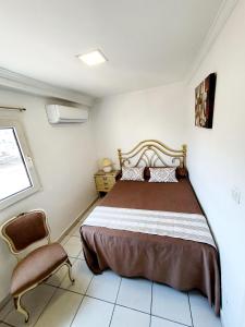 Postel nebo postele na pokoji v ubytování Hotel Marítimo Urban