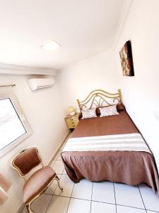Postel nebo postele na pokoji v ubytování Hotel Marítimo Urban