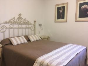 Postel nebo postele na pokoji v ubytování Hotel Marítimo Urban
