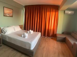 Hotel Dodona 객실 침대