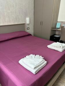 Postel nebo postele na pokoji v ubytování Scilla Resort