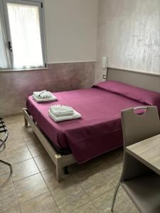 Postel nebo postele na pokoji v ubytování Scilla Resort