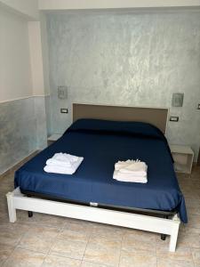 Postel nebo postele na pokoji v ubytování Scilla Resort