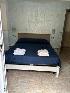 Postel nebo postele na pokoji v ubytování Scilla Resort
