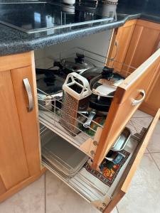 A kitchen or kitchenette at beautiful apartment near the beach