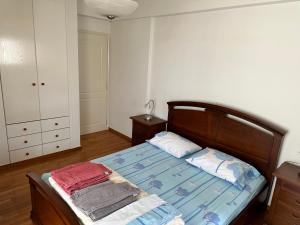 A bed or beds in a room at beautiful apartment near the beach