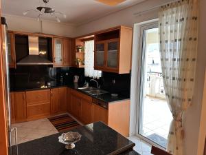 A kitchen or kitchenette at beautiful apartment near the beach
