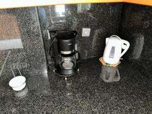 Coffee and tea making facilities at beautiful apartment near the beach