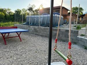 a playground with a seesaw and a swing at Lipite Guest House 