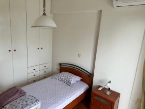 A bed or beds in a room at beautiful apartment near the beach