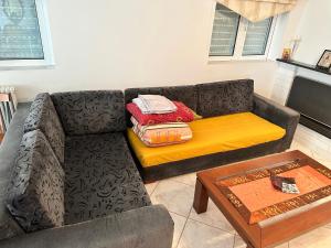 A seating area at beautiful apartment near the beach