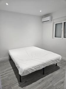 Ένα ή περισσότερα κρεβάτια σε δωμάτιο στο Casa MA II